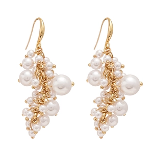 French vintage baroque pearl tassel hook earrings with gold metal accents in white background