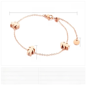 Detailed view of rose gold stainless steel bracelet with girl pendants and size markings