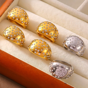 British retro wide-band gold and silver rings set with sparkling rhinestones