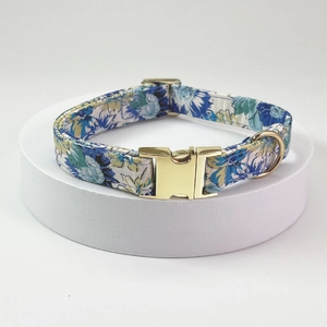 Floral pet collar with blue and yellow fabric and gold metal quick-release buckle details