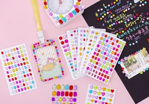 Colorful acrylic diamond stickers set showing DIY decoration on alarm clock and card holders