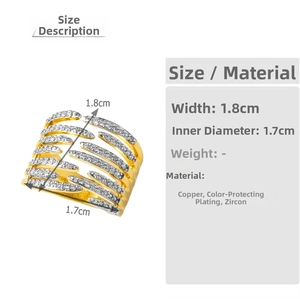 Macro detail of 18k gold plated snowflake ring with dimensions 1.8cm width and 1.7cm diameter