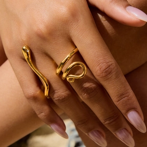 18K gold plated stainless steel snake ring with white zircon eyes on model's hand