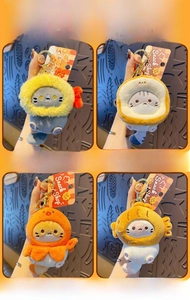 Close-up of four plush cat keychains featuring shrimp, toast, and snack designs