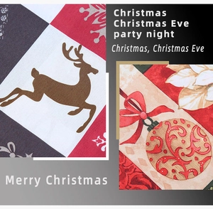 Detail of Christmas table runner fabric texture with reindeer and festive party print