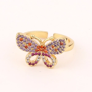 Detailed view of adjustable butterfly ring with multi-color zircon stones and gold finish