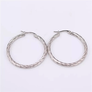 Silver twisted rope hoop earrings in polished stainless steel for a minimalist look