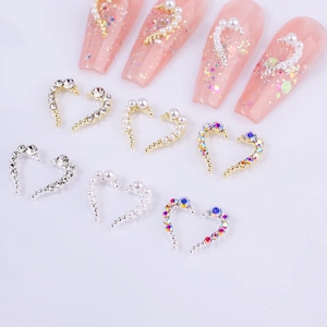 Symmetric heart nail charms with pearls and rhinestones for DIY manicure art