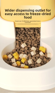 Macro detail of the wide dispensing outlet for mixed pet food and freeze-dried snacks