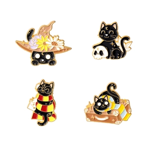 Set of four cute black cat enamel pins with moon and magic gold metal plating