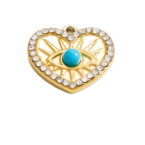 Pendentif cœur œil maléfique doré avec perle bleue et strass blancs scintillants