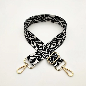Adjustable black and white geometric woven replacement shoulder strap with gold metal hooks