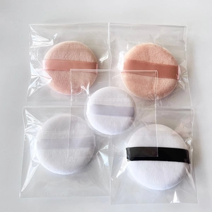 Set of five soft crystal velvet round powder puffs in pink, white, and beige colors