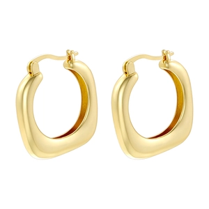 Close-up of chunky gold geometric hoop earrings with polished finish and secure clasp