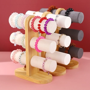 3-tier bamboo jewelry display stand with white and grey velvet T-bars for bracelets