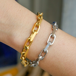 Polished 18K gold and silver chunky Cuban chain bracelets for men and women