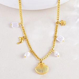 Ocean-style stainless steel necklace with turtle dolphin shell charms and irregular pearls