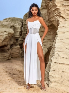 White strapless evening gown with mesh rhinestone waist and high double slits