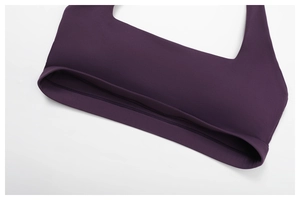 Detailed view of high-support U-neck yoga sports bra in deep purple knitted fabric