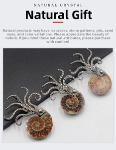 Close-up of three octopus brooches featuring natural ammonite fossil texture and silver tentacles