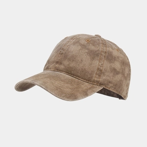 Detailed view of the washed coffee brown cotton twill baseball cap with vintage texture