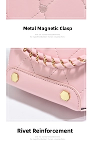 Detail of pink heart-quilted leather bag with metal rivets and woven chain strap