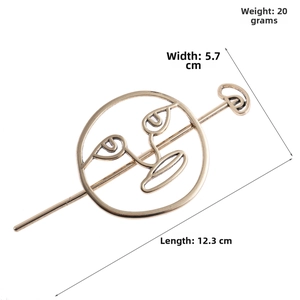 Detail shot of vintage alloy hair pin showing dimensions: length 12.3cm and width 5.7cm