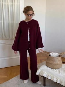 Elegant burgundy knit two-piece set featuring long-sleeved cardigan and wide-leg trousers