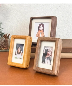 Macro view of walnut wood photo frame showing natural texture and rounded corner craftsmanship