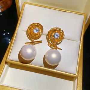 Elegant 14K gold plated swirl earrings with zircons and large white pearls in a gift box