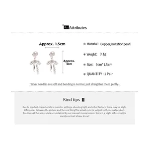 Detailed view of bowknot pearl earrings with dimensions 3cm by 1.5cm and silver pins
