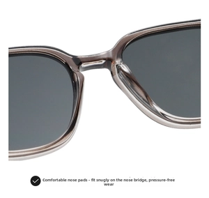 Detail view of comfortable integrated nose pads on translucent grey square sunglasses