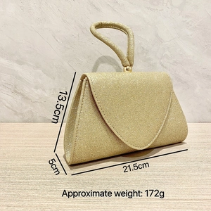 Golden glitter triangle handbag dimensions showing 13.5cm height and 21.5cm width
