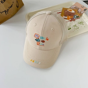 Close-up of beige mesh baseball cap with fish embroidery and my little cutie text