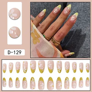 French tip false nails with yellow edge, white daisy art, and small pearls 24pcs