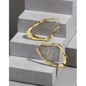 Minimalist irregular gold S925 sterling silver earrings with a fluid liquid metal design