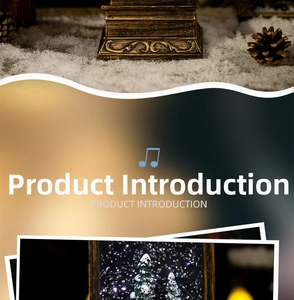 Close-up of vintage bronze relief base and musical snow globe interior with pine trees