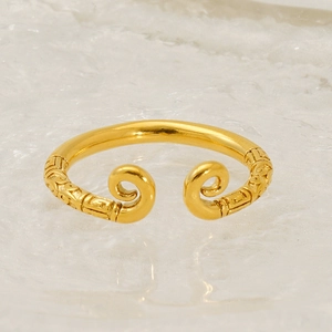 Close-up of golden Sun Wukong ring with traditional auspicious cloud pattern engraving