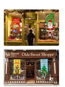 Hanging Merry Christmas banners with cartoon legs for store window display decoration