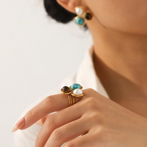 French vintage stainless steel jewelry set with pearls, turquoise, and tiger eye stones
