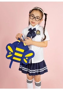 Detail of cute bee-shaped toddler backpack with yellow stripes and blue wings