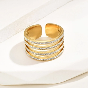 Detail of five-layer gold plated ring with micro-pave crystals and brushed metal finish