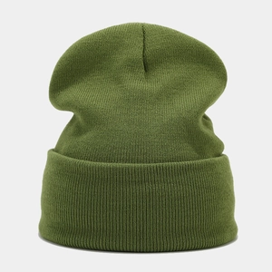 Detailed knit texture of an olive green cuffed beanie hat in fine ribbed patterns