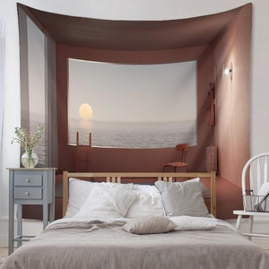 Detailed view of bohemian tapestry fabric with a sunset sea window view print