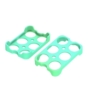 Vista detallada de dos soportes para 6 huevos en silicona verde menta para almacenamiento