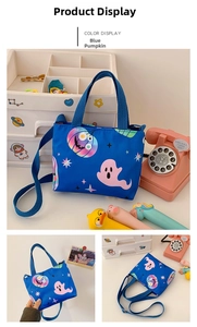 Blue canvas bag with pink ghost and colorful pumpkin patterns for children
