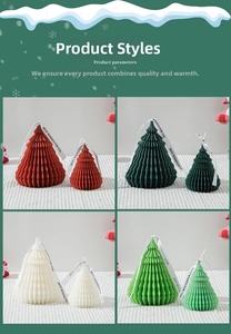 Detail view of origami Christmas tree candles with white ribbons and festive messages