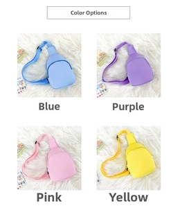 Four colorful PU leather toddler crossbody bags displayed on a plush white rug