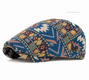 Detailed texture of ethnic geometric jacquard fabric on a navy blue beret flat cap