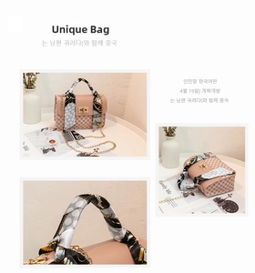 Detailed view of pink leather and patterned crossbody bag with silk scarf on handle